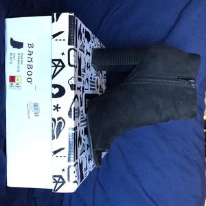 Open toed heeled black bootie